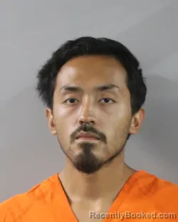 Booking photograph for Ramon Torres